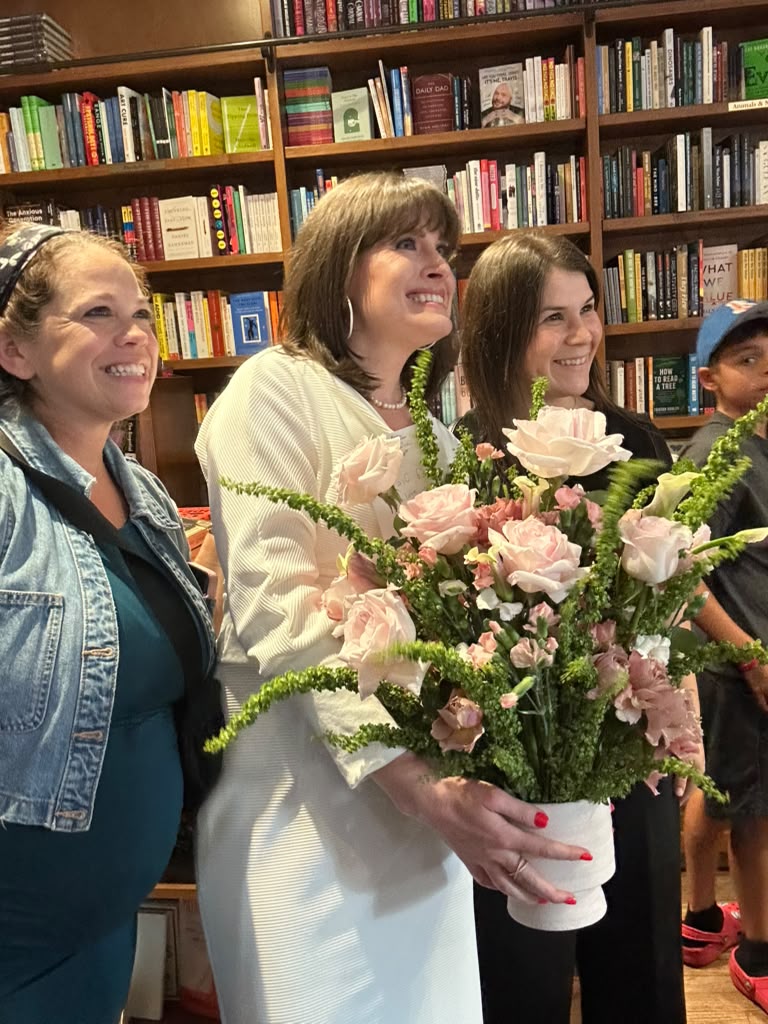 C.P. with flowers after the Books & Books launch