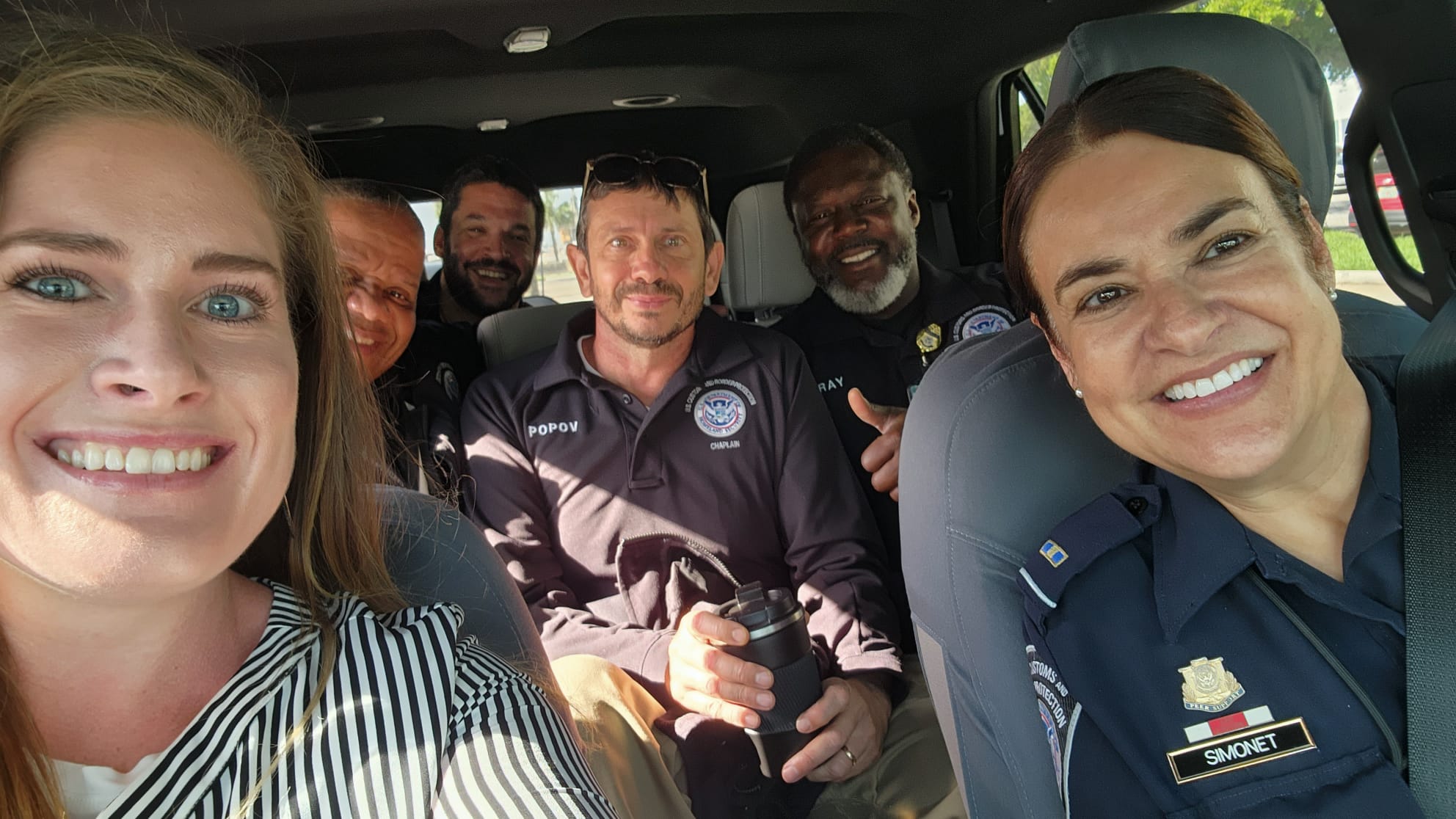 C.P. Handler with U.S. Customs and Border Protection officers and chaplains