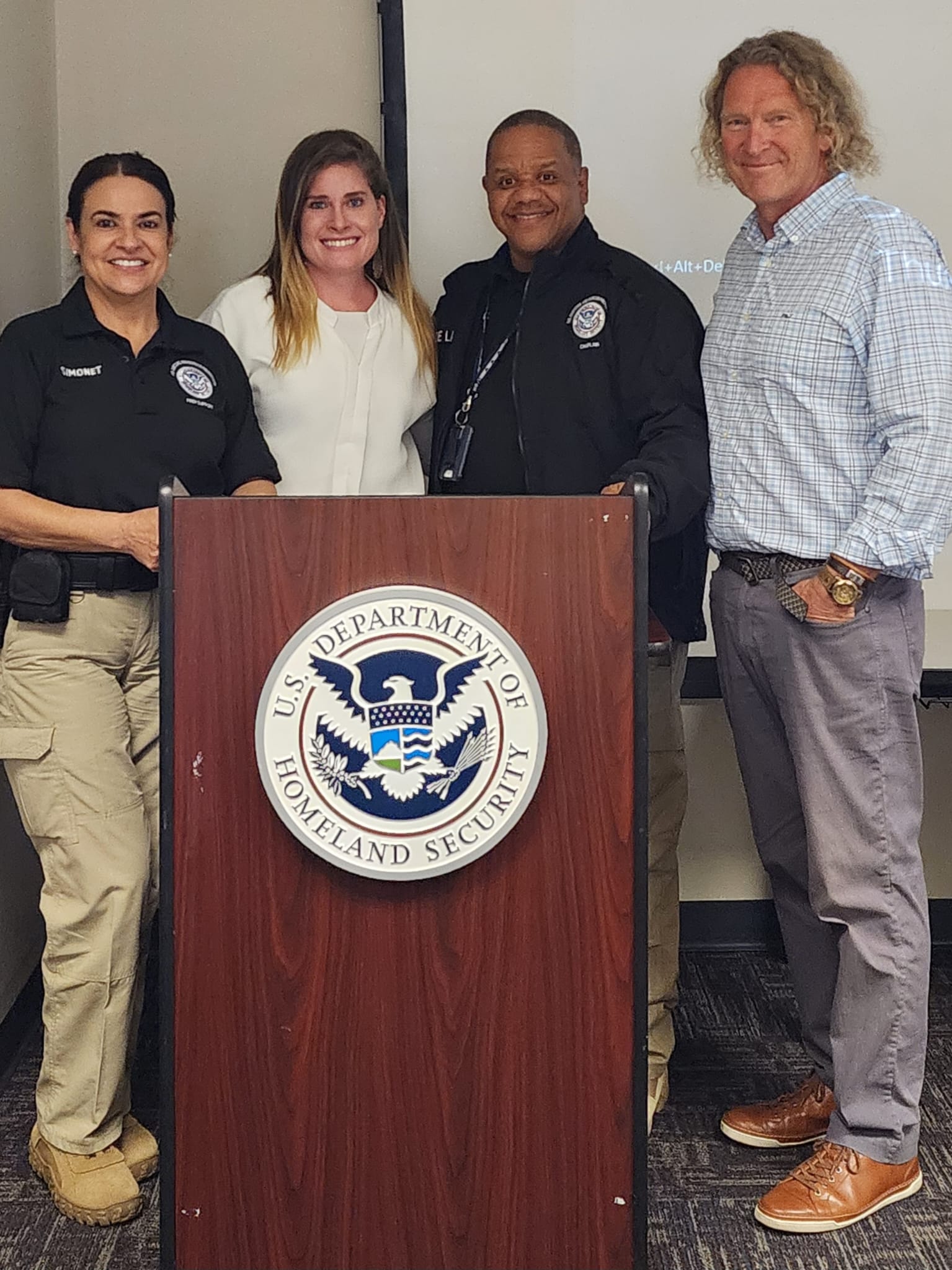 C.P. Handler with U.S. Department of Homeland Security personnel after a suicide prevention training