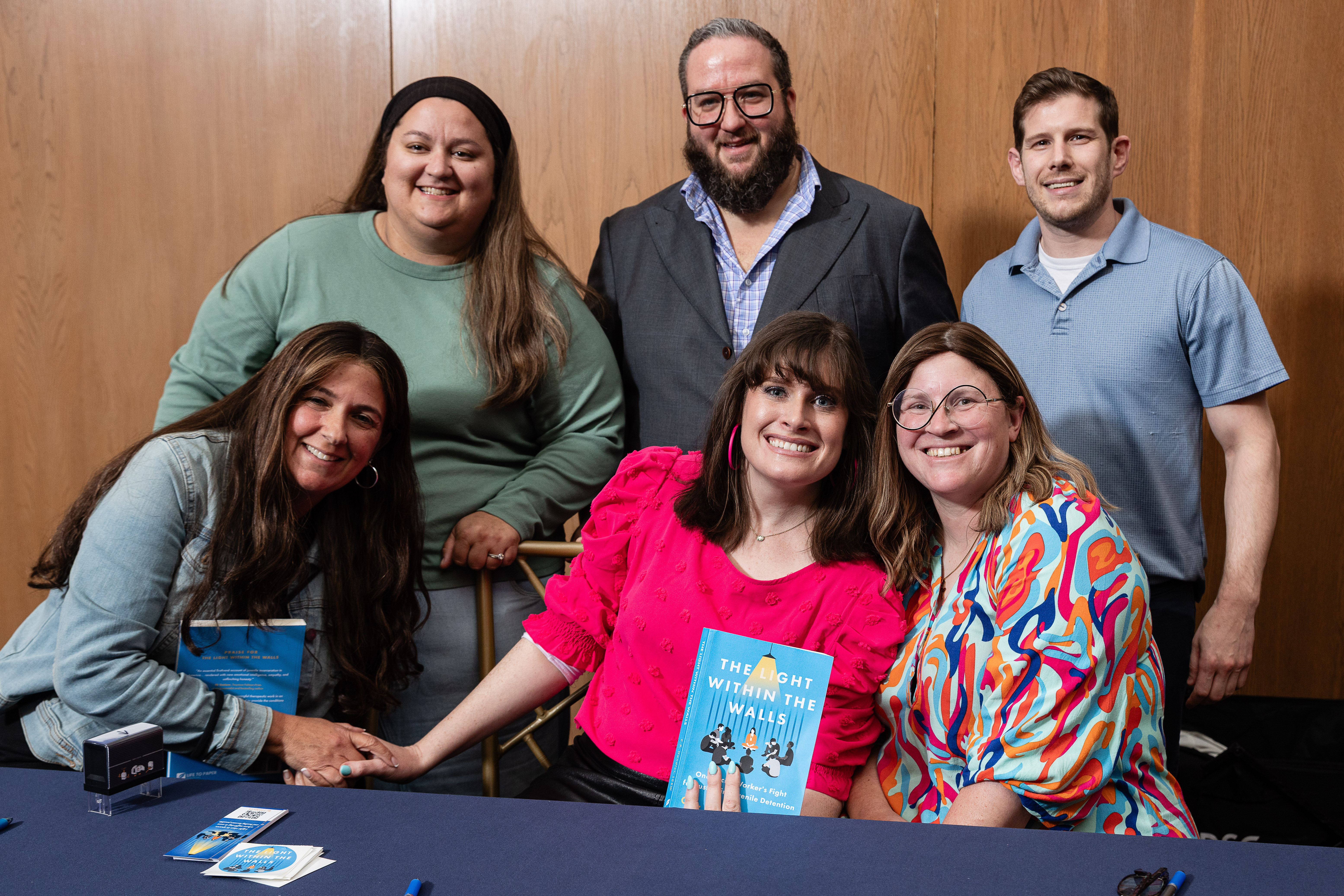 C.P. Handler signing books with friends at JFX